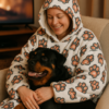 20251128215731-1f0cca53-d0bd-64a6-8f22-f6683bfa1fb3.png Cute Strong Pawz Hooded Blanket — Paw Print Cozy Throw for Pet Lovers